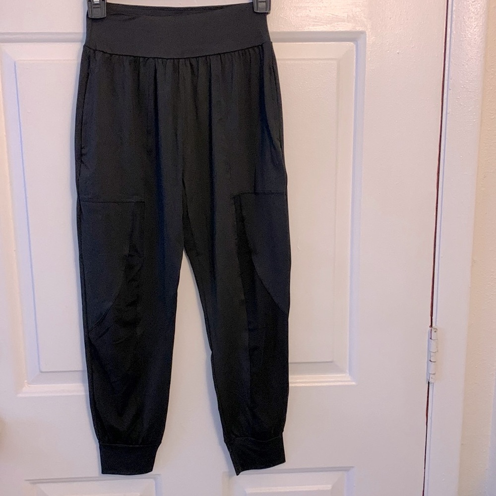 black leggings.tapered ankle.elastic waist. nylon polyester. S feels like XS.